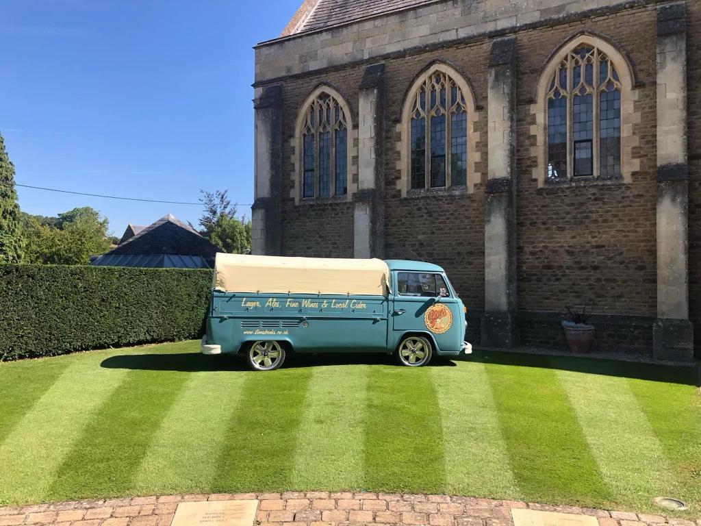 Stan VW in front of a building
